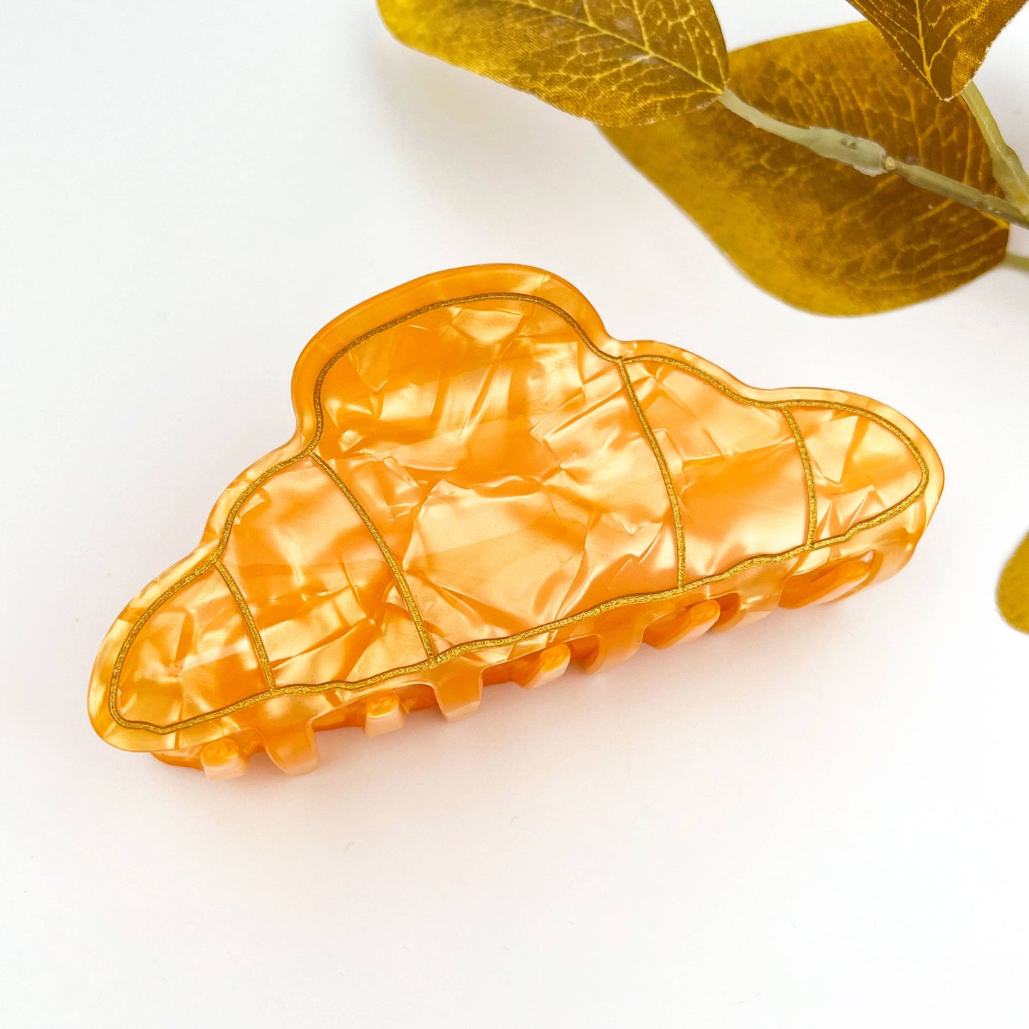 
                  
                    Croissant Acrylic Hair Claw
                  
                