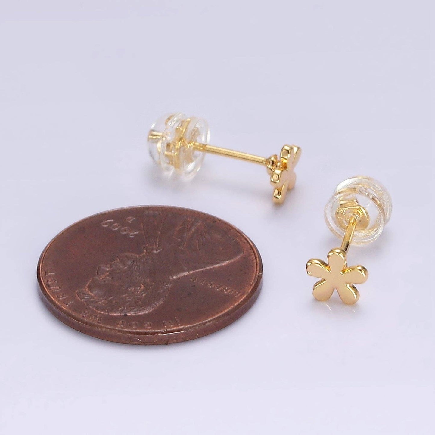 
                  
                    Minimalist Mini Flower Stud
                  
                