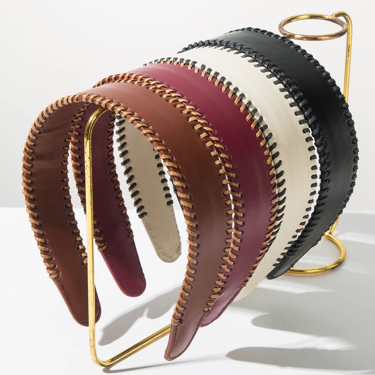 
                  
                    Wide Brim Leather Headband
                  
                