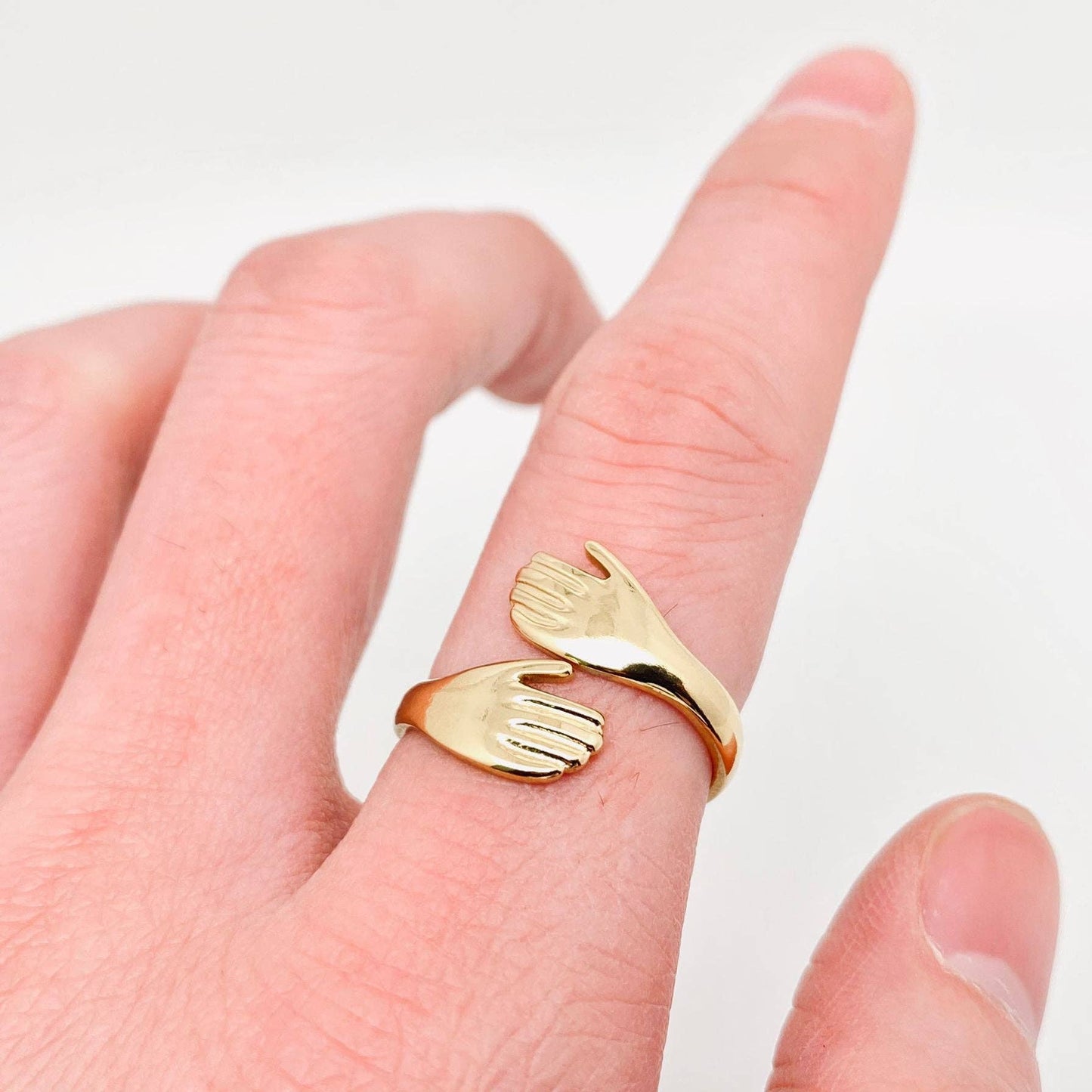 
                  
                    Gold Plated Adjustable Hug Ring
                  
                