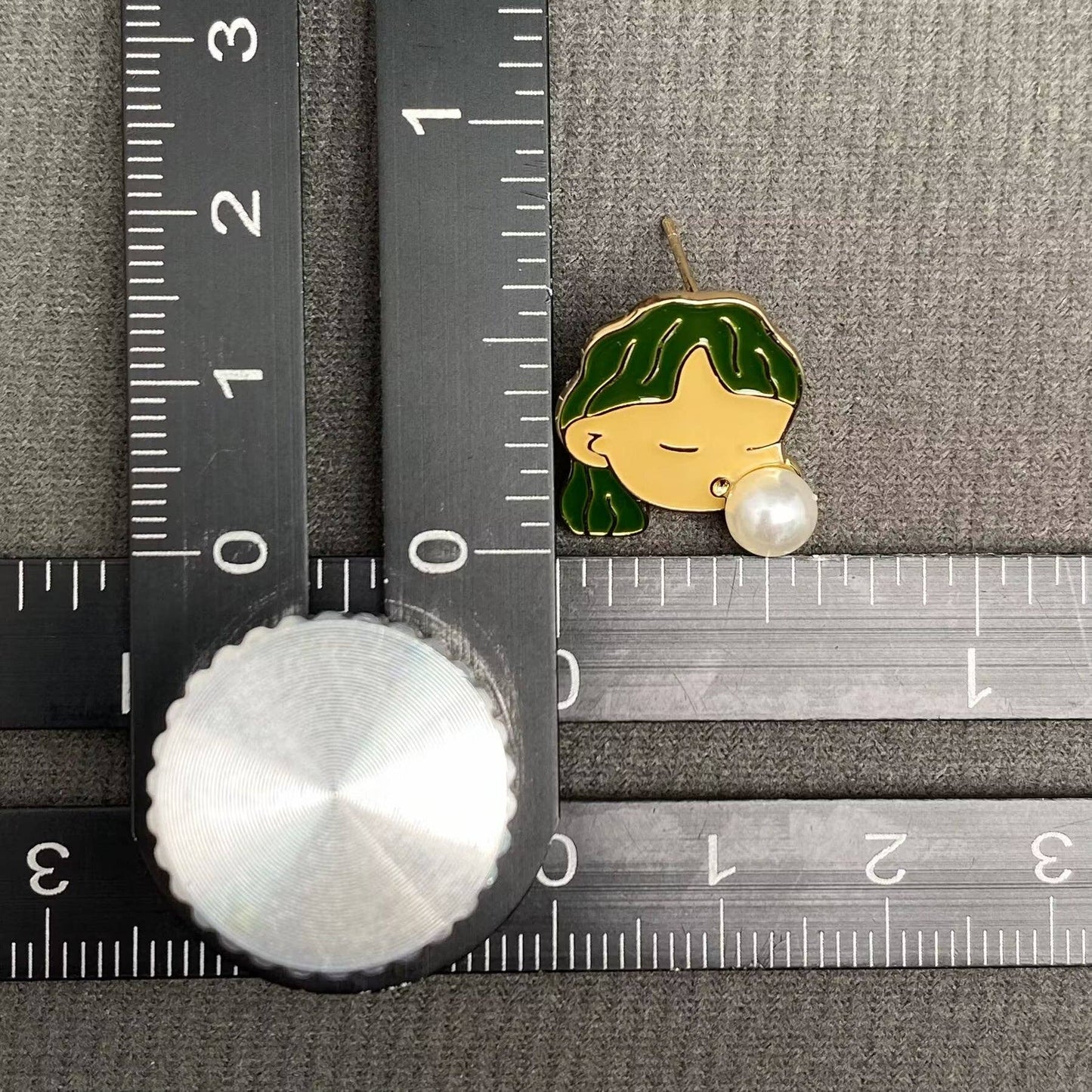 
                  
                    Bubble Blowing Girl Enamel Stud Earrings
                  
                