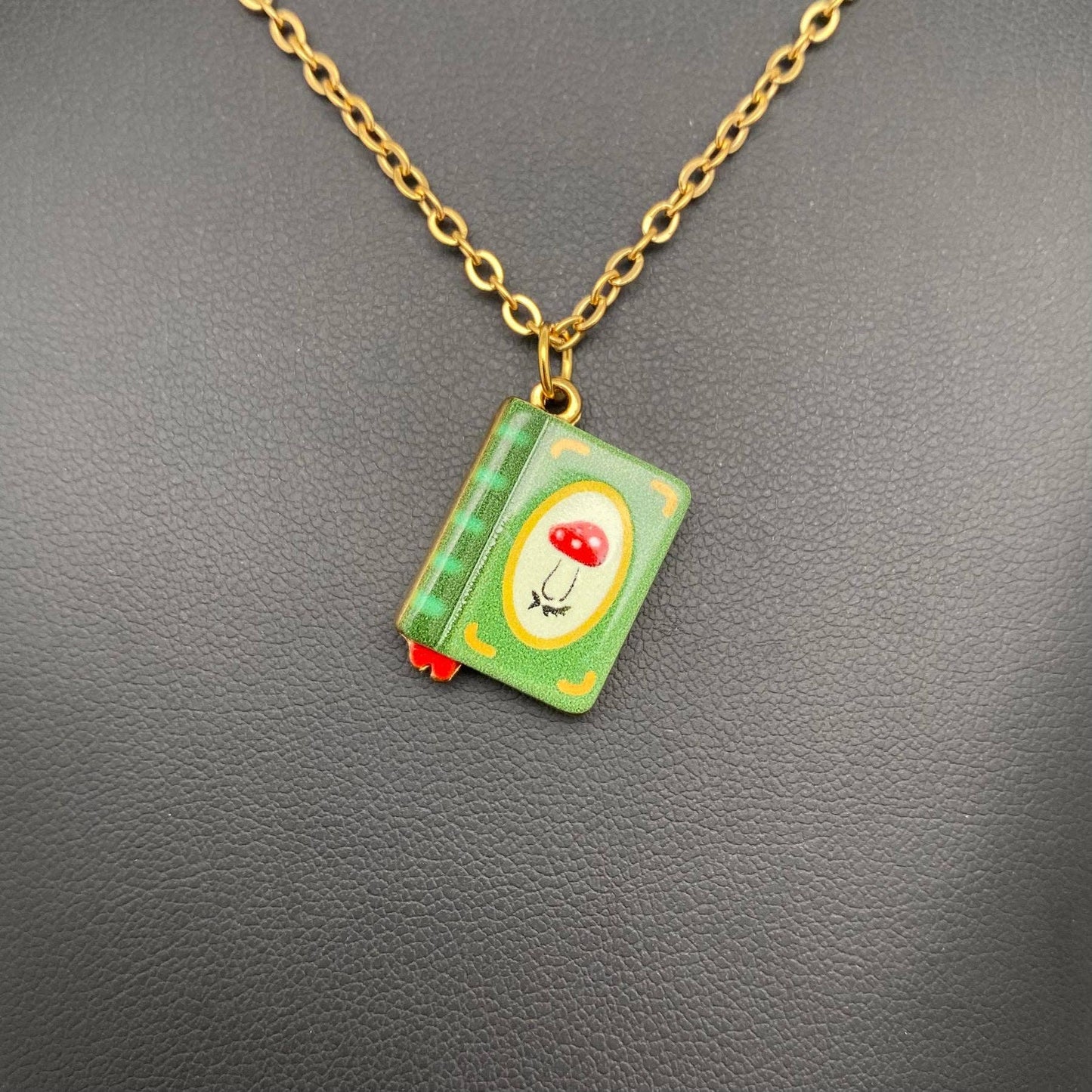 
                  
                    Enamel Book Charm Necklace
                  
                