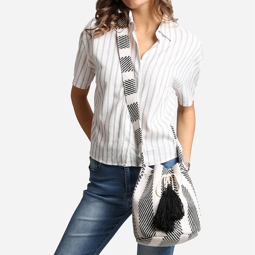
                  
                    Slouchy Crossbody Bucket Bag with Tassels
                  
                