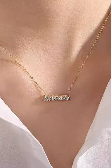 
                  
                    Studded Bar Necklace
                  
                