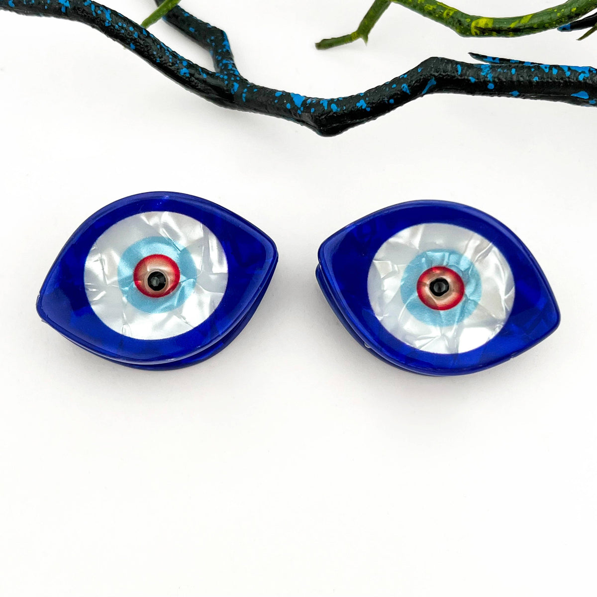 
                  
                    Evil Eye Mini Hair Claws
                  
                