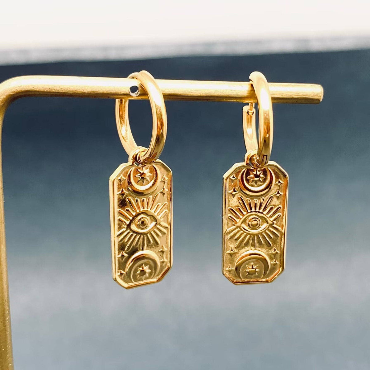 
                  
                    Evil Eye Tarot Card Charm Huggies
                  
                
