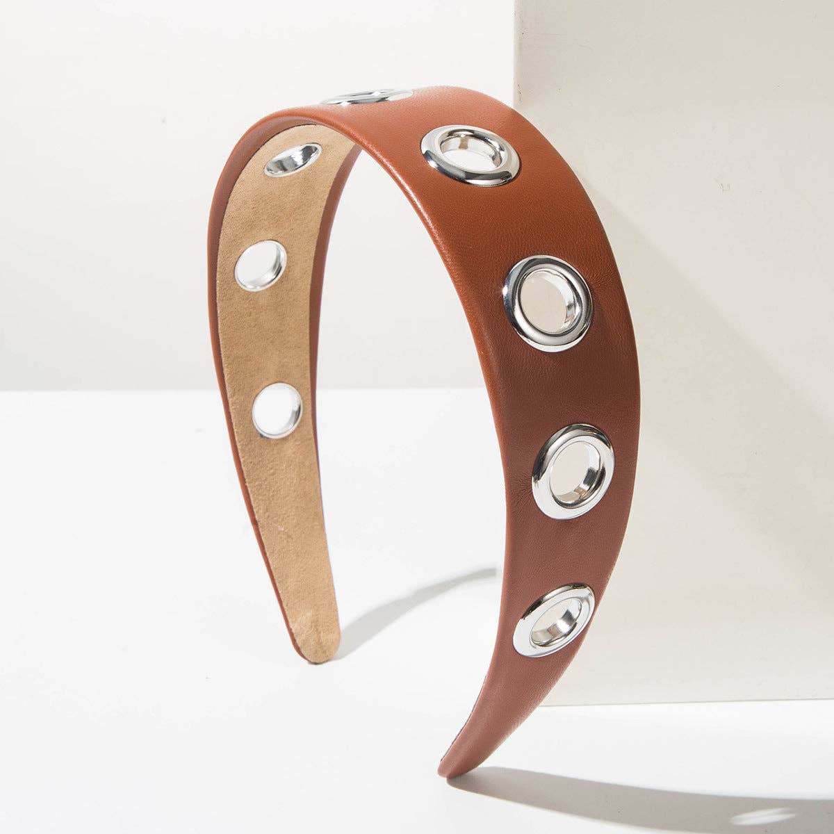 
                  
                    90s Metal Eyelets Headband
                  
                