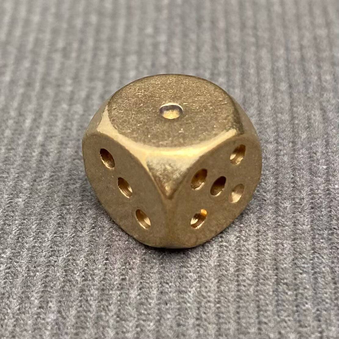 
                  
                    Brass Dice
                  
                