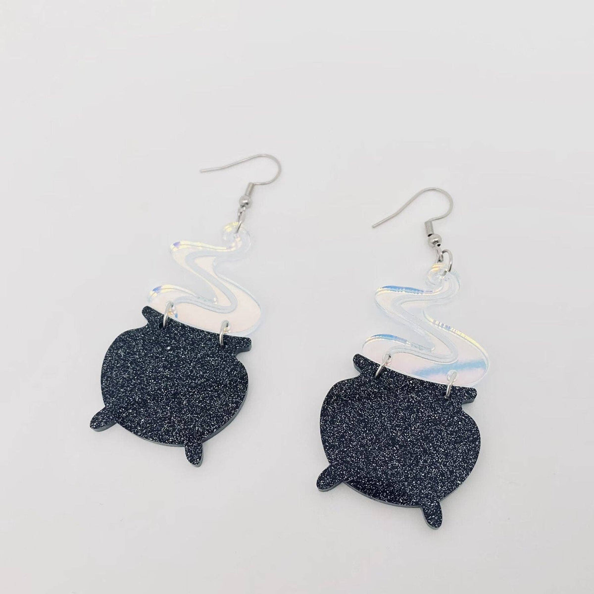 
                  
                    Iridescent Acrylic Cauldron Earrings
                  
                