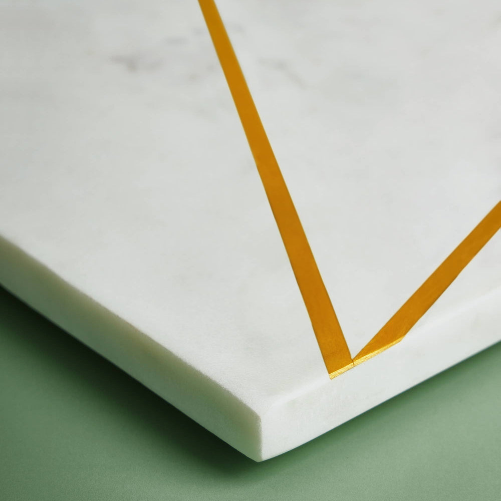 
                  
                    Marble with Brass Inlay Geometric Paddle Cheeseboard
                  
                