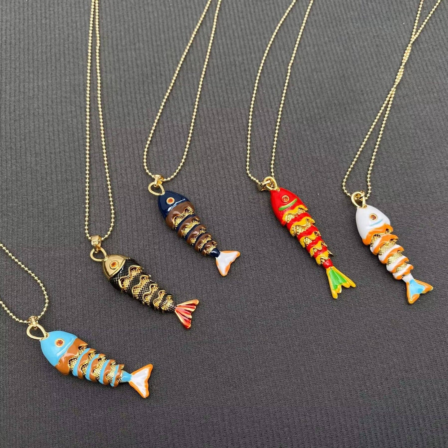 
                  
                    Enamel Wiggle Fish Necklace
                  
                