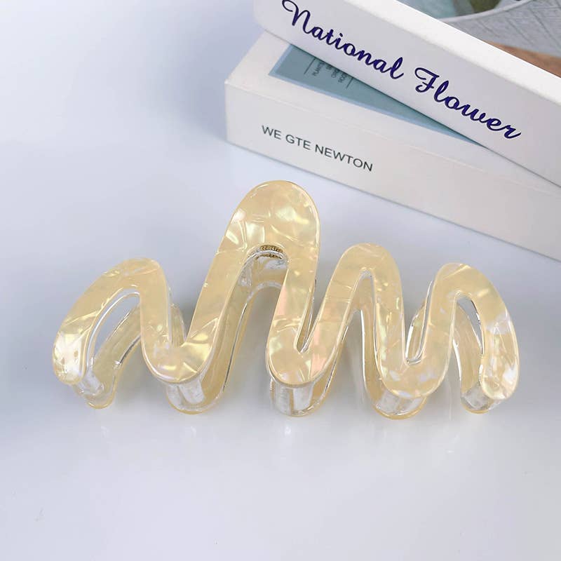 
                  
                    Pearly Squiggle Hair Claw
                  
                