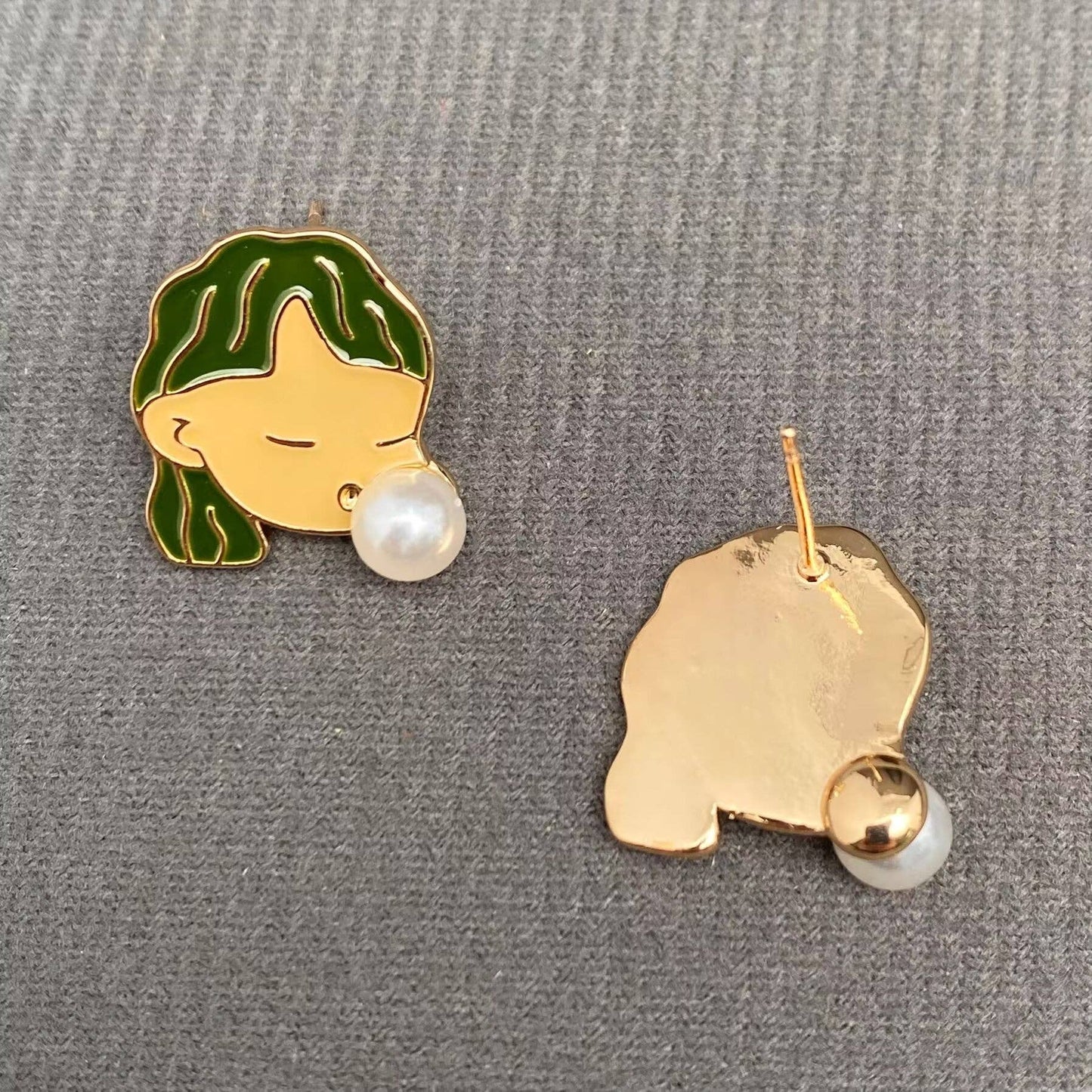 
                  
                    Bubble Blowing Girl Enamel Stud Earrings
                  
                