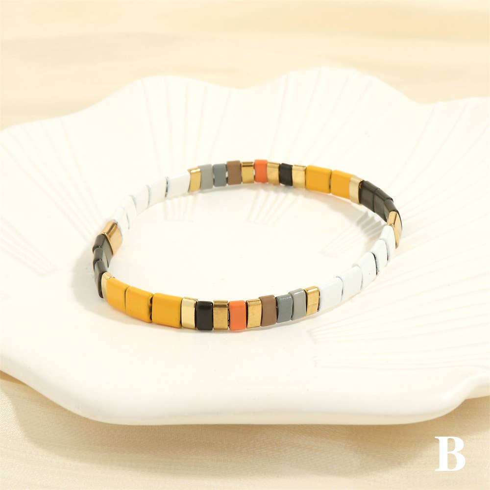 
                  
                    Glass TILA + Hematite Beaded Elastic Bracelets (Collection B)
                  
                