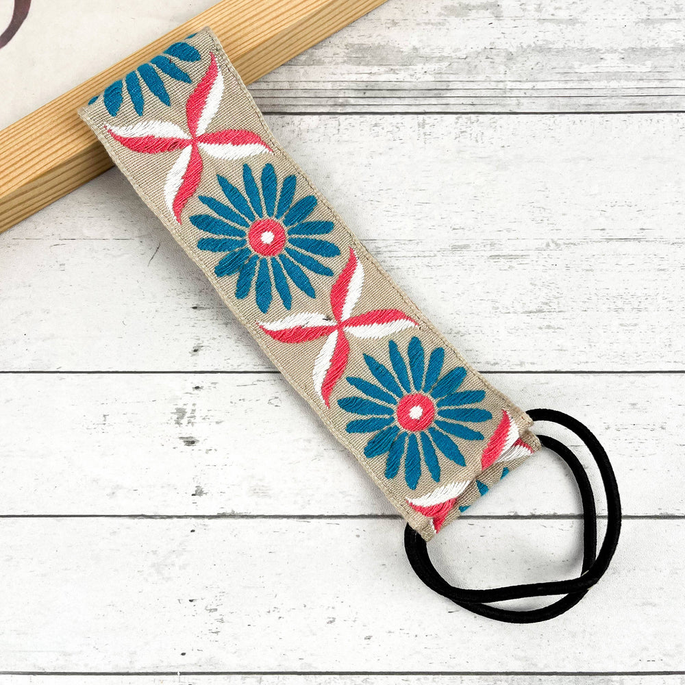 
                  
                    Embroidered Coneflower Knotted Headband
                  
                