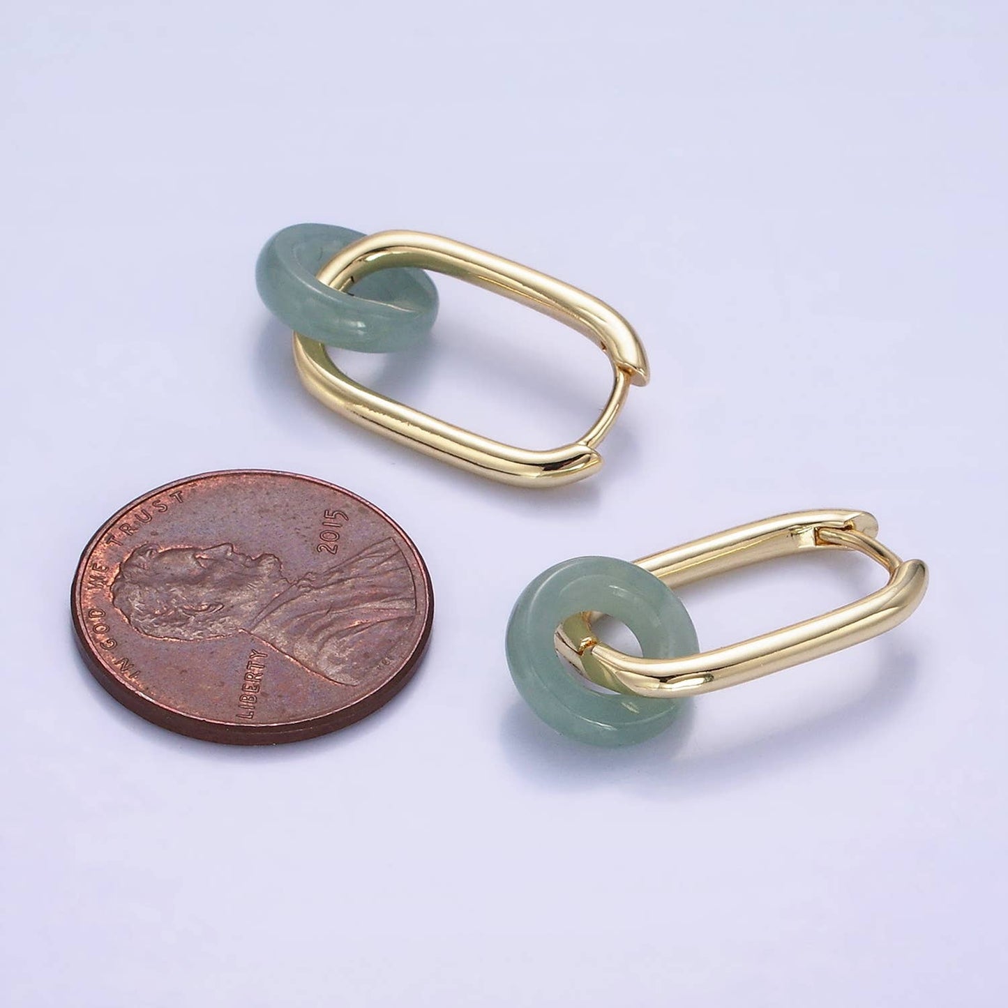 
                  
                    Oblong Jade Donut Bead Huggies
                  
                
