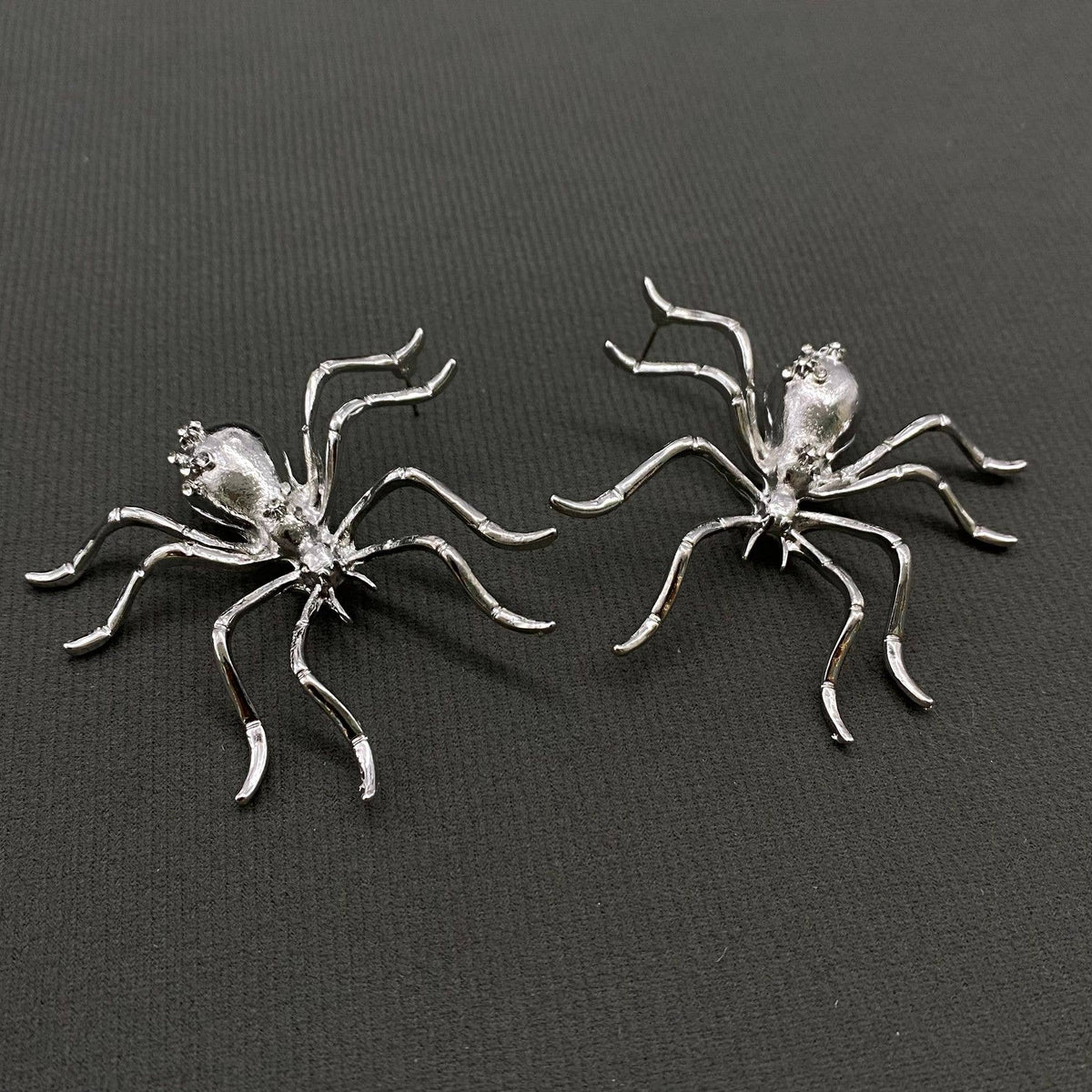 
                  
                    Oversized Creeping Spider Post Earrings
                  
                