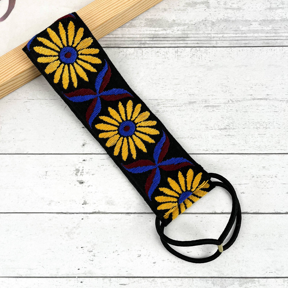 
                  
                    Embroidered Coneflower Knotted Headband
                  
                