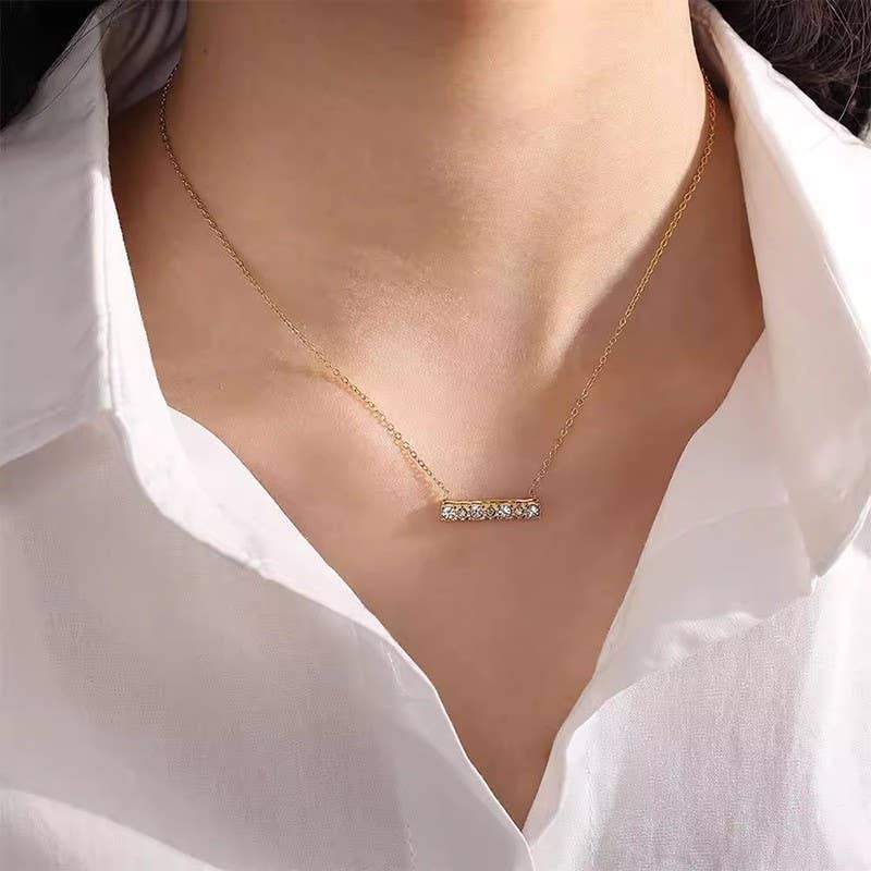 
                  
                    Studded Bar Necklace
                  
                