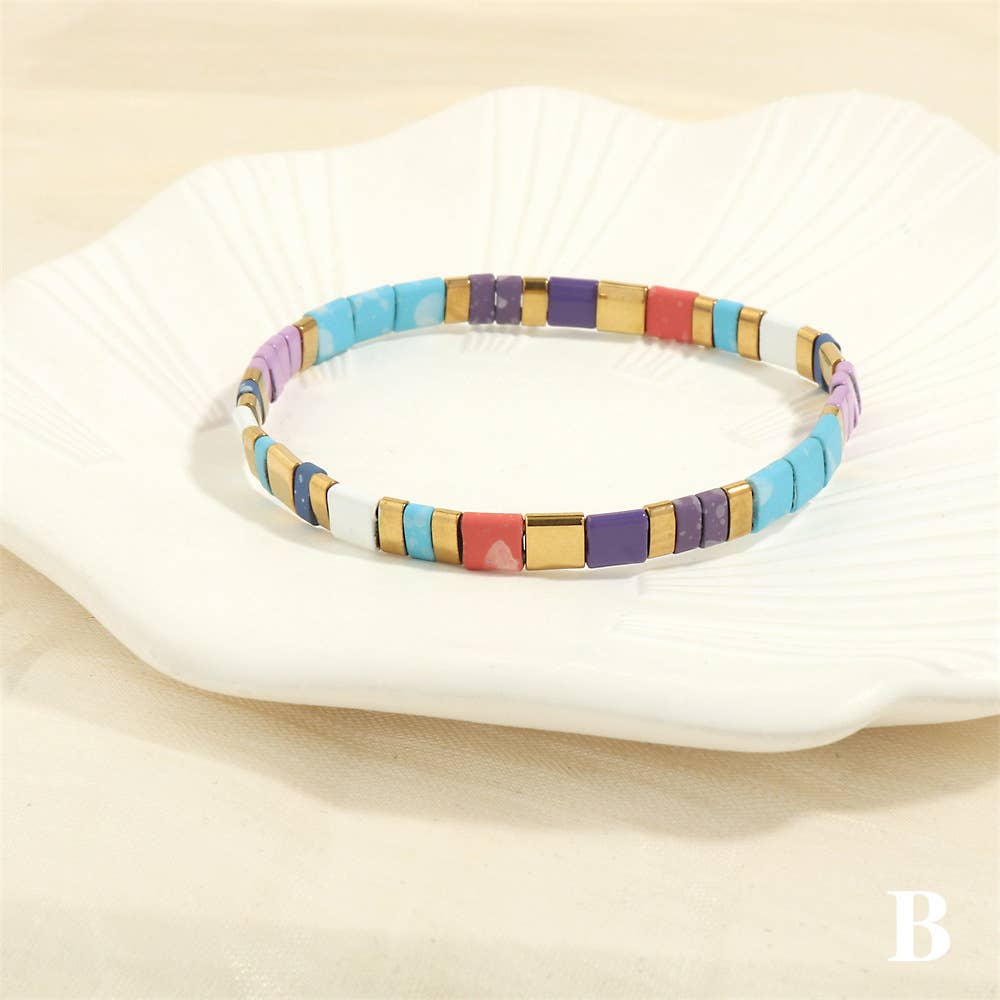 
                  
                    Glass TILA + Hematite Beaded Elastic Bracelets (Collection B)
                  
                