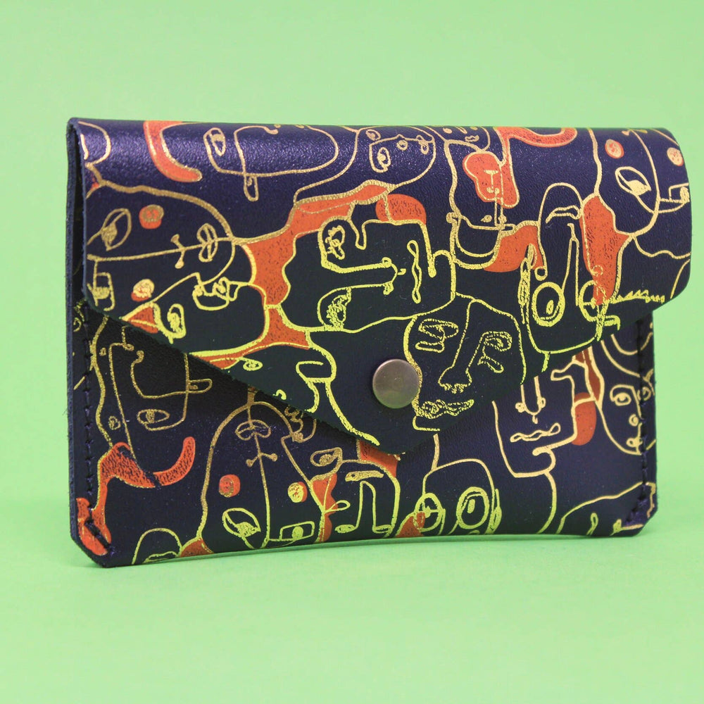 
                  
                    Many Faces Leather Popper Purse
                  
                