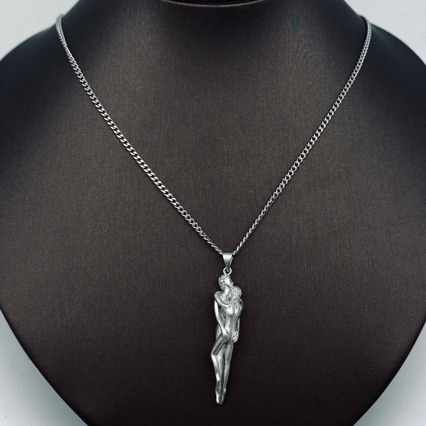 
                  
                    Embracing Lovers Charm Necklace
                  
                