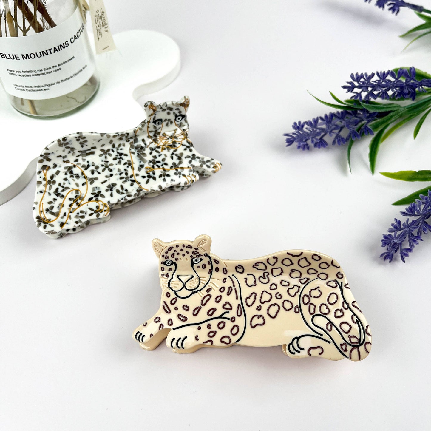 
                  
                    Lounging Leopards Hair Claw
                  
                