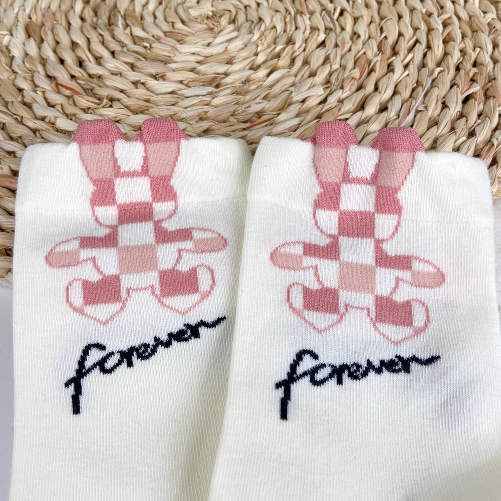 
                  
                    Peek-a-boo Floral Socks
                  
                