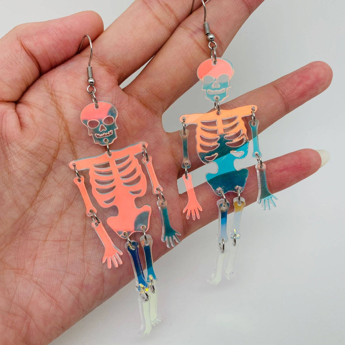 
                  
                    Iridescent Acrylic Skeleton Earrings
                  
                