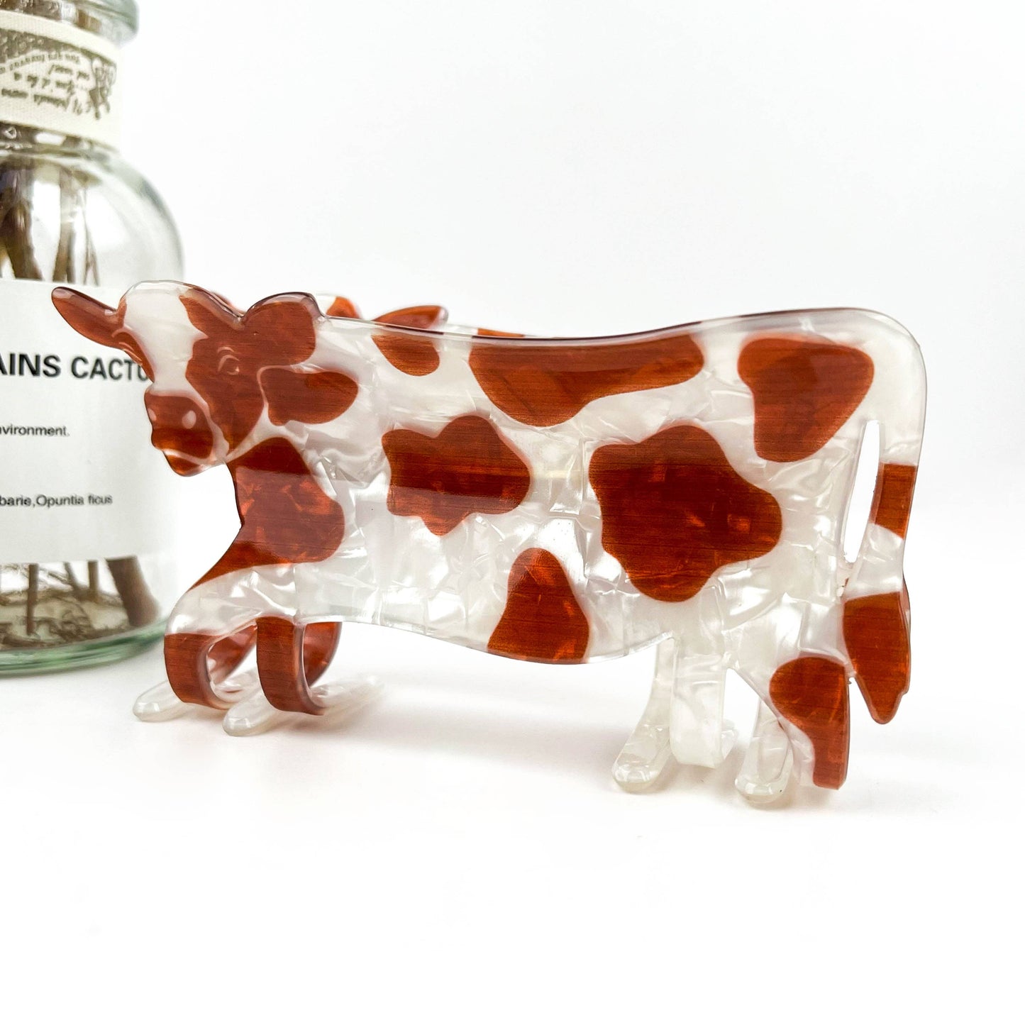 
                  
                    Brown and White Cow Claw
                  
                