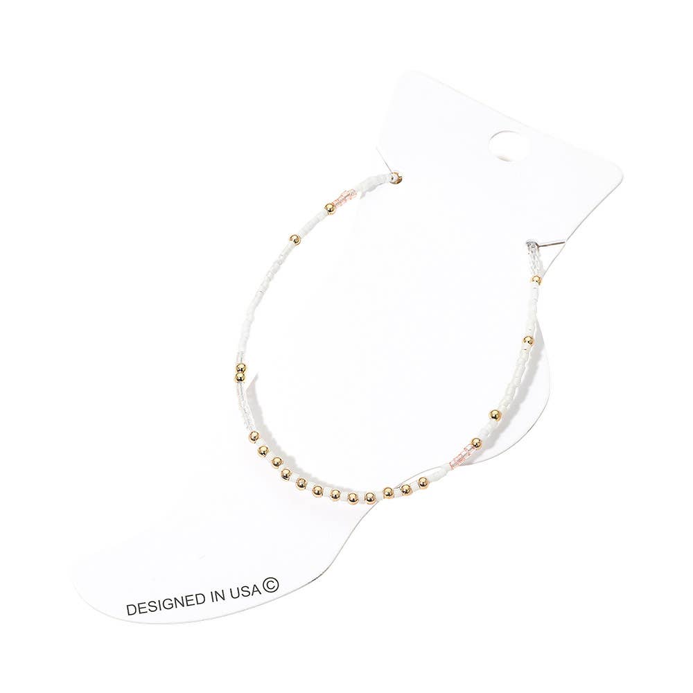 
                  
                    White + Gold Seed Beaded Petite Anklet
                  
                