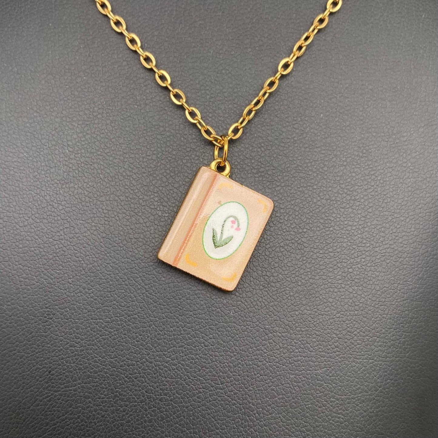
                  
                    Enamel Book Charm Necklace
                  
                