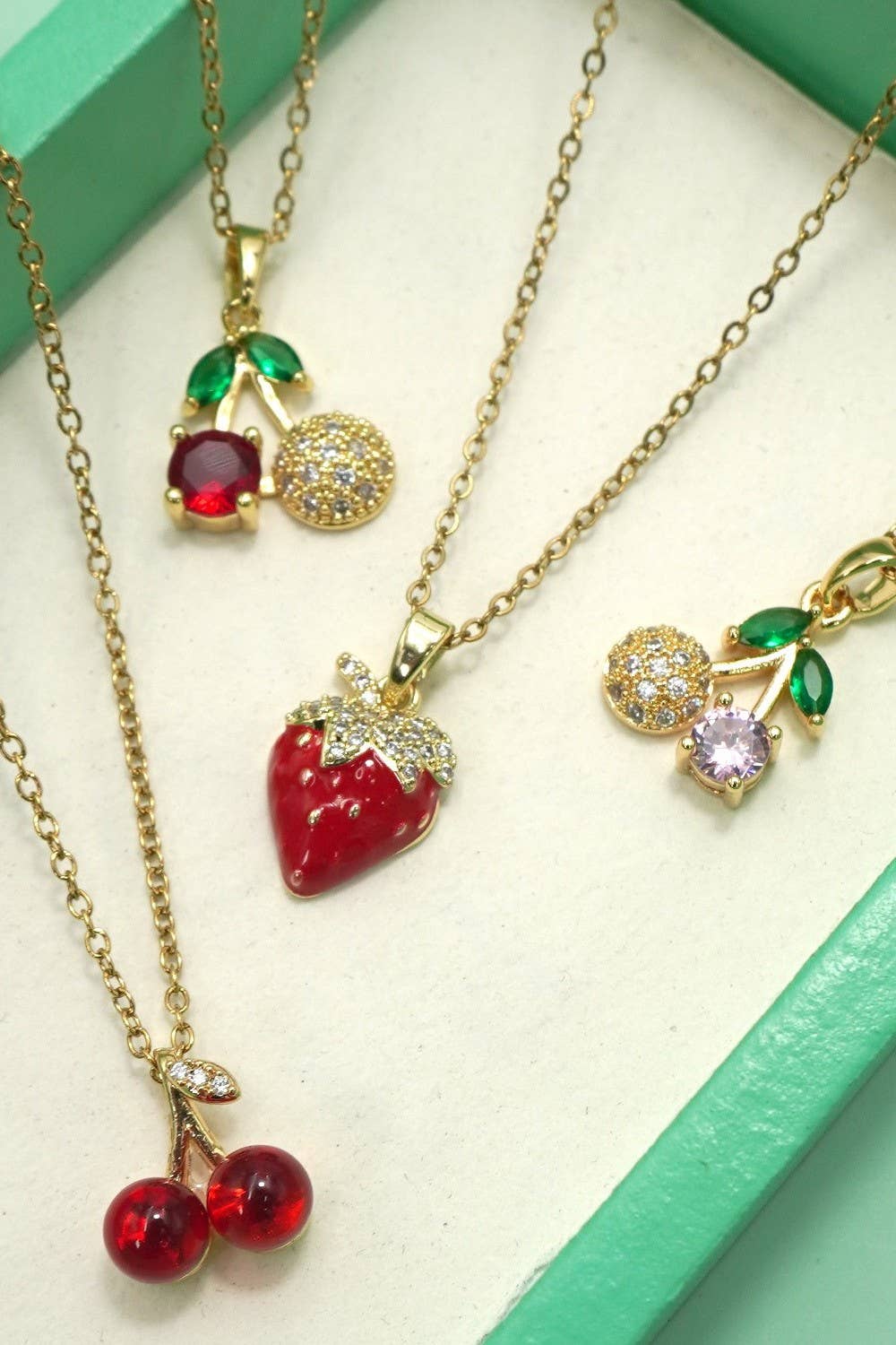 
                  
                    Fruit Charm Necklaces
                  
                