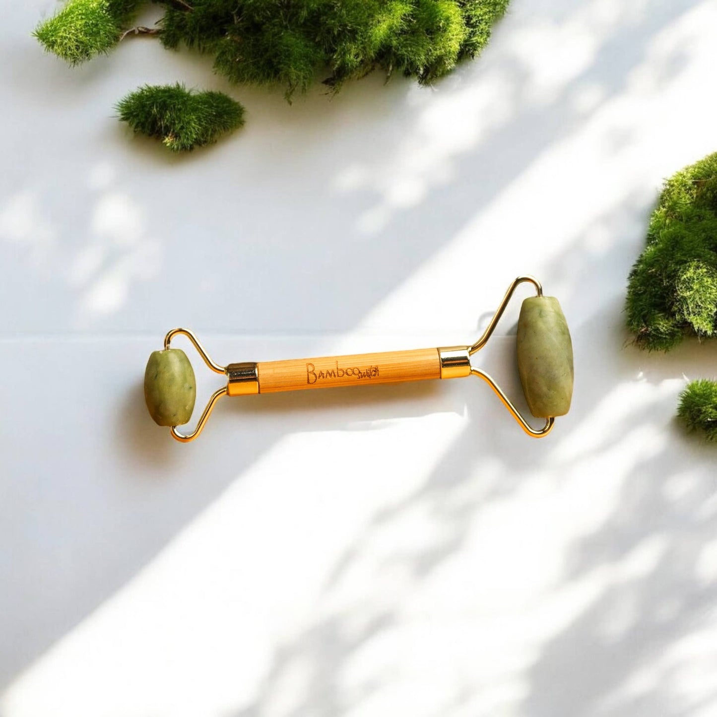 
                  
                    Stone + Bamboo Facial Massage Roller
                  
                