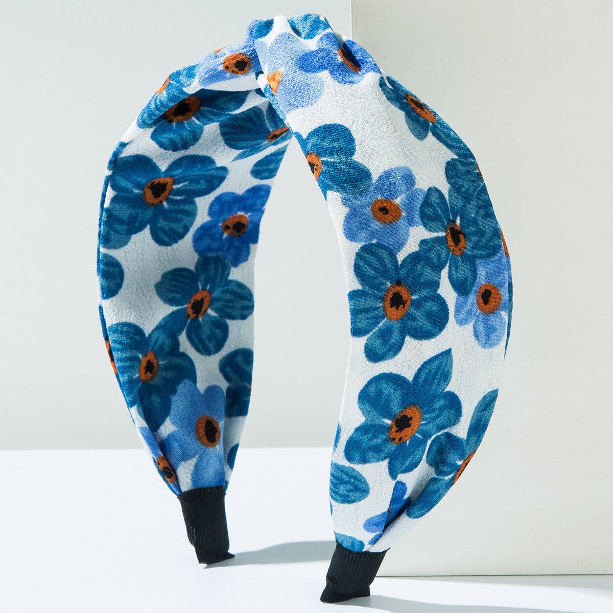 
                  
                    Painterly Florals Twist Top Headband
                  
                