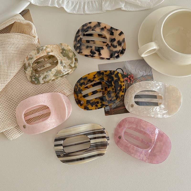 
                  
                    Marbled Oval Flat Hair Claw
                  
                