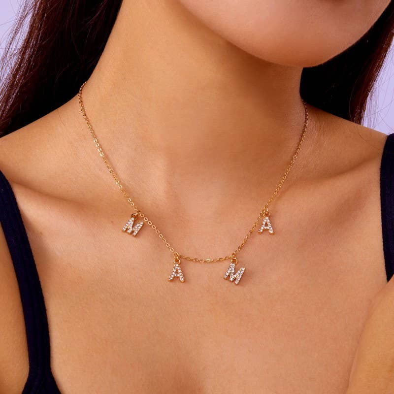 
                  
                    M-A-M-A Studded Charms Necklace
                  
                