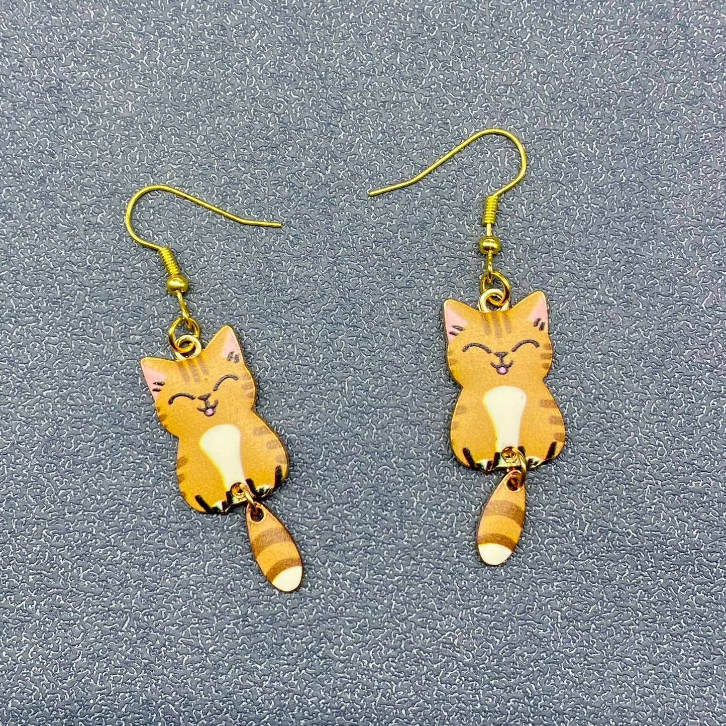 
                  
                    Swinging Tail Cat Earrings
                  
                