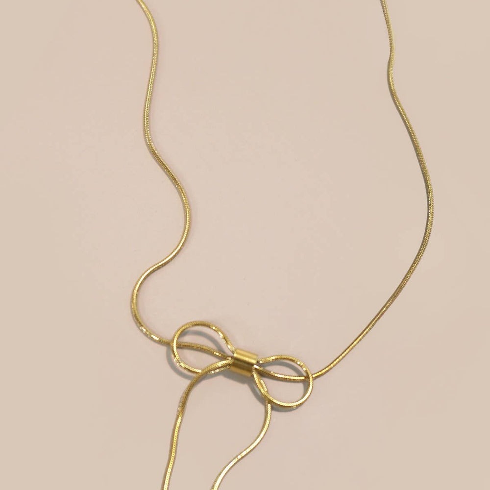 
                  
                    Gold Bow Cable Necklace
                  
                