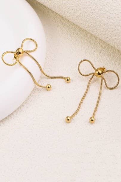 
                  
                    Silver Bow Movement Earrings
                  
                