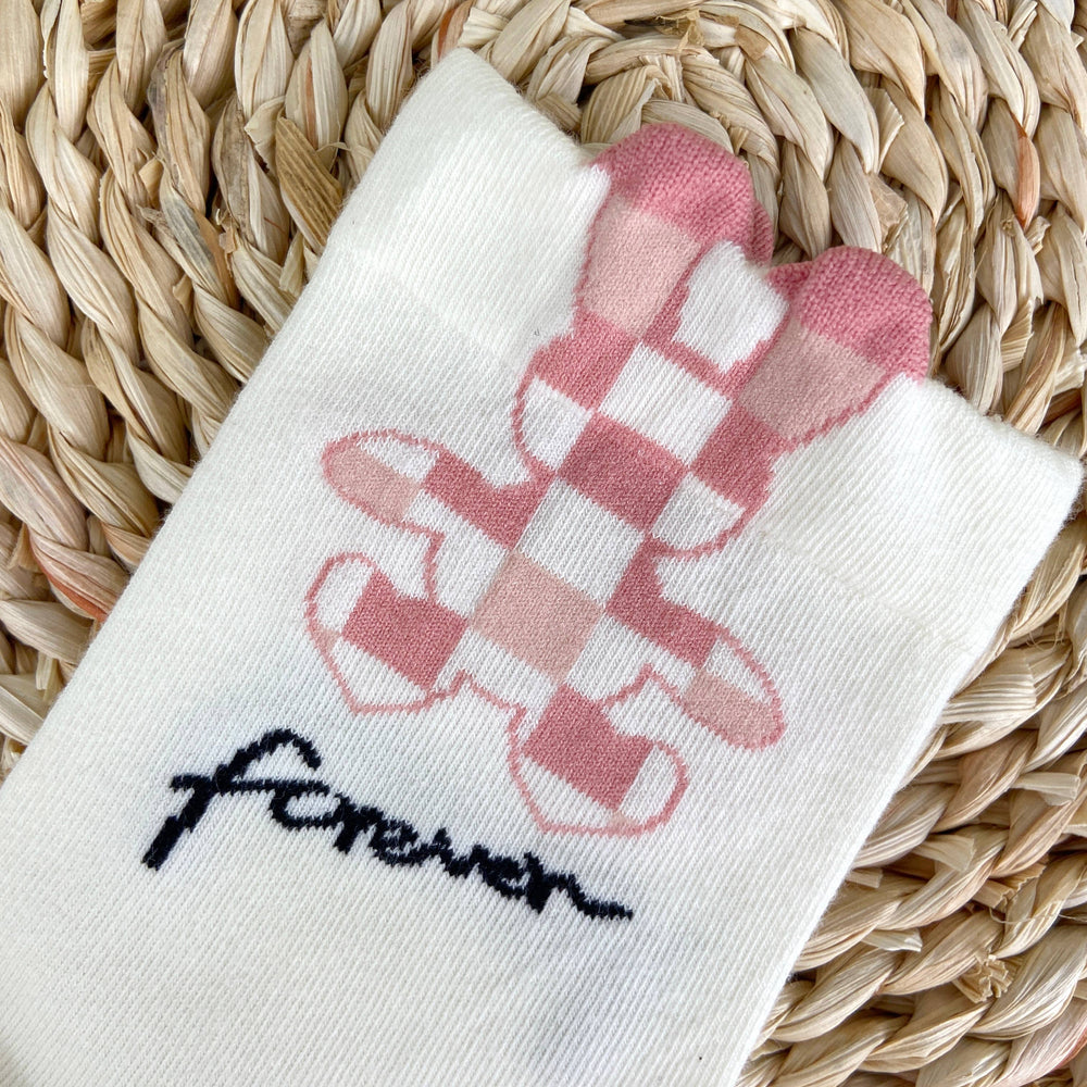 
                  
                    Peek-a-boo Floral Socks
                  
                