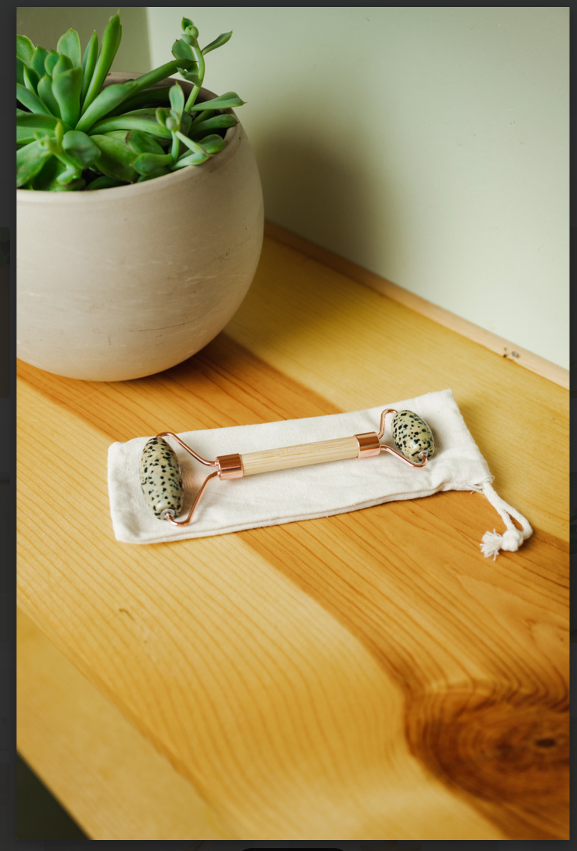 
                  
                    Stone + Bamboo Facial Massage Roller
                  
                
