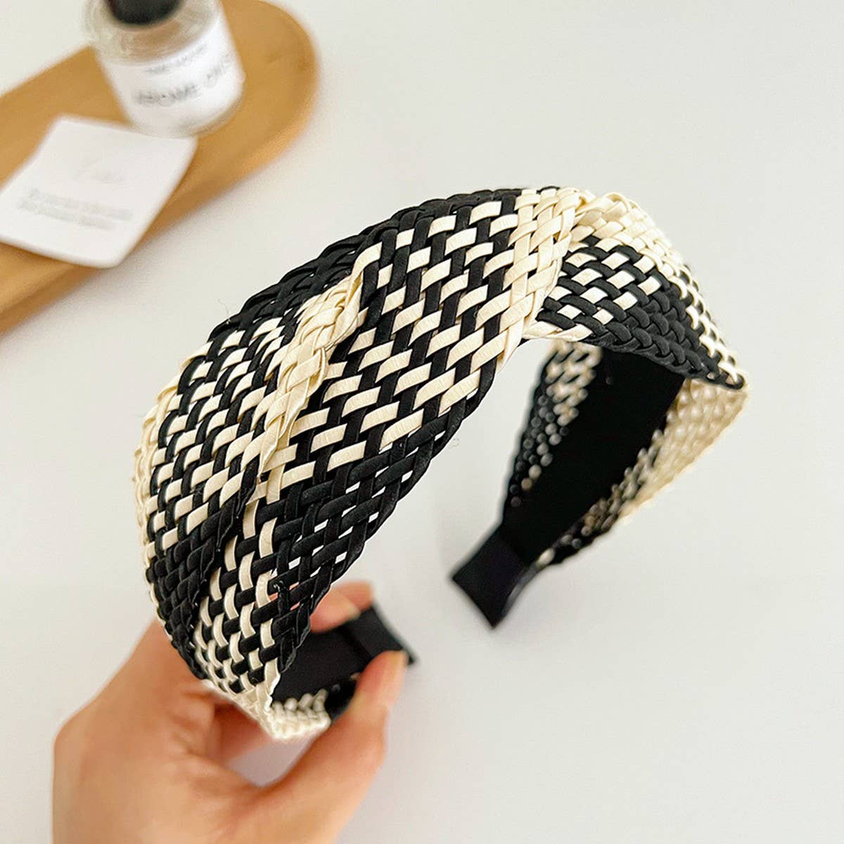 
                  
                    Woven Twist Top Headband
                  
                