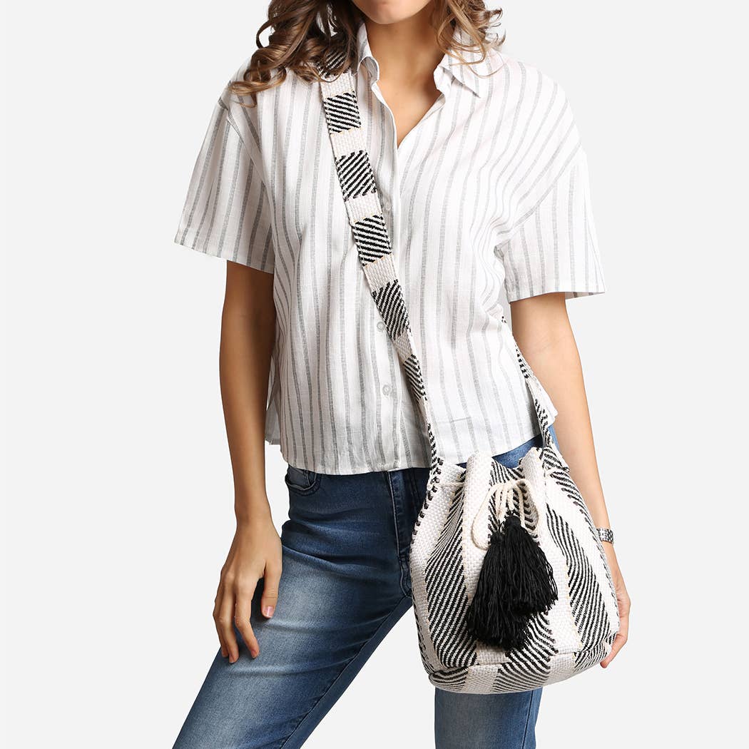 
                  
                    Slouchy Crossbody Bucket Bag with Tassels
                  
                