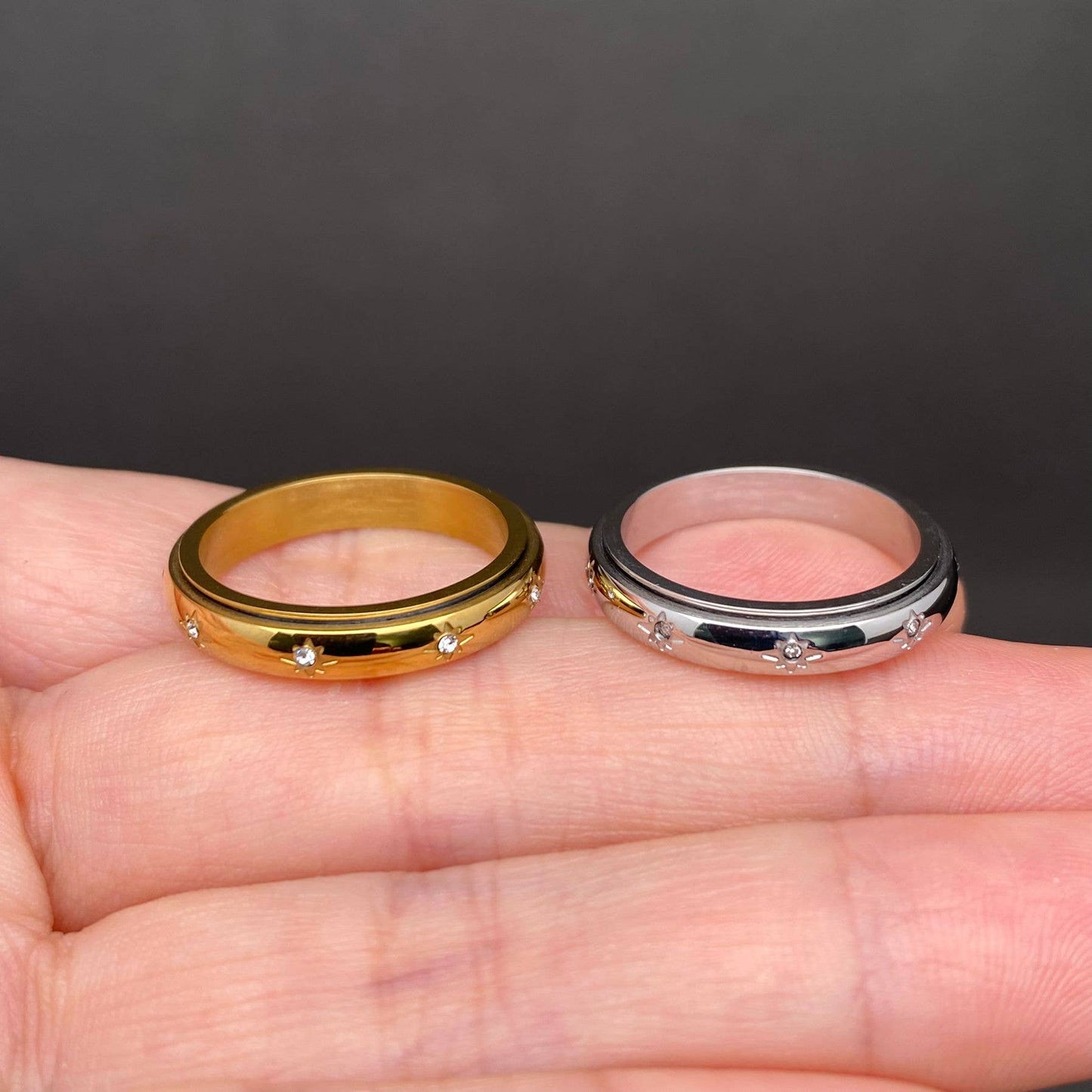 
                  
                    Inlaid Stars Spinner Ring
                  
                