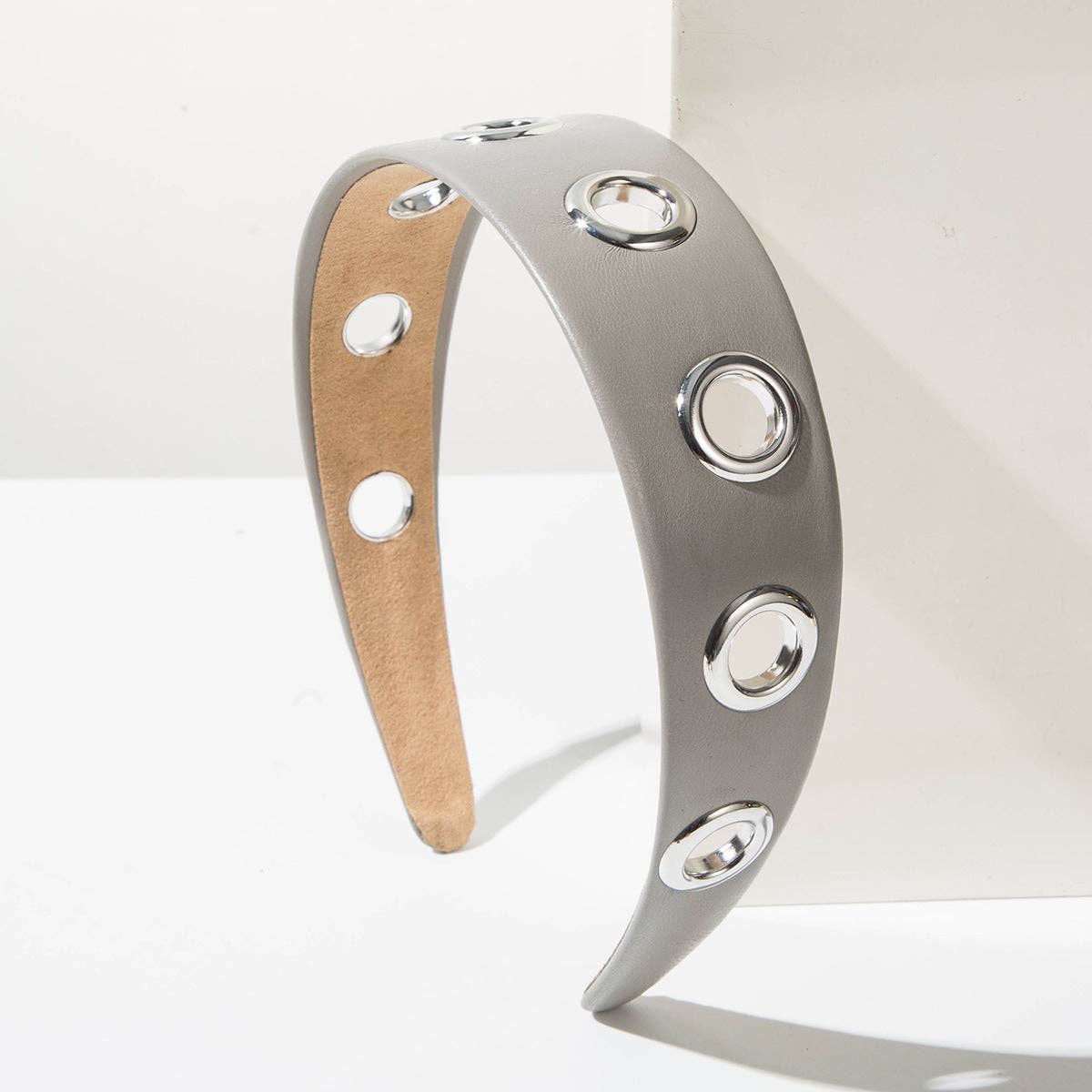 
                  
                    90s Metal Eyelets Headband
                  
                