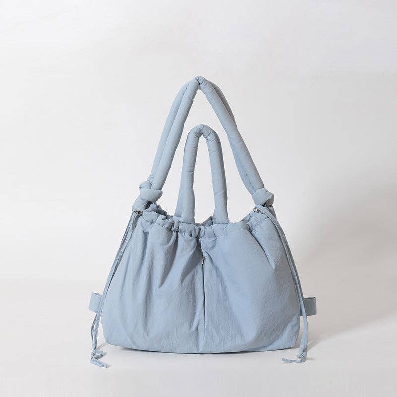 
                  
                    Convertible Large Capacity Nylon Puffer Backpack/Tote
                  
                