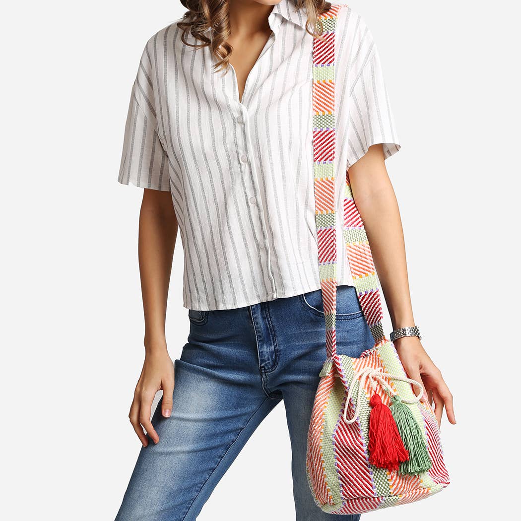 
                  
                    Slouchy Crossbody Bucket Bag with Tassels
                  
                