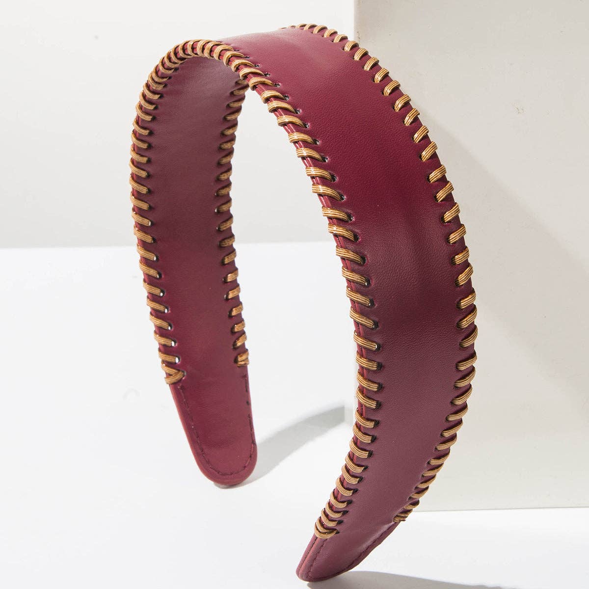 
                  
                    Wide Brim Leather Headband
                  
                