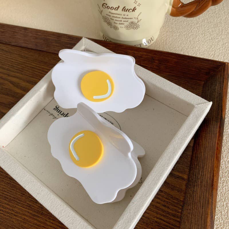 
                  
                    Fried Egg Hair Claw
                  
                